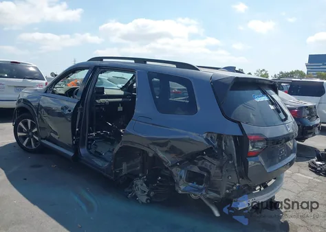 2025 Honda Pilot Touring z USA, uszkodzony, nr VIN 5FNYG2H71SB005076